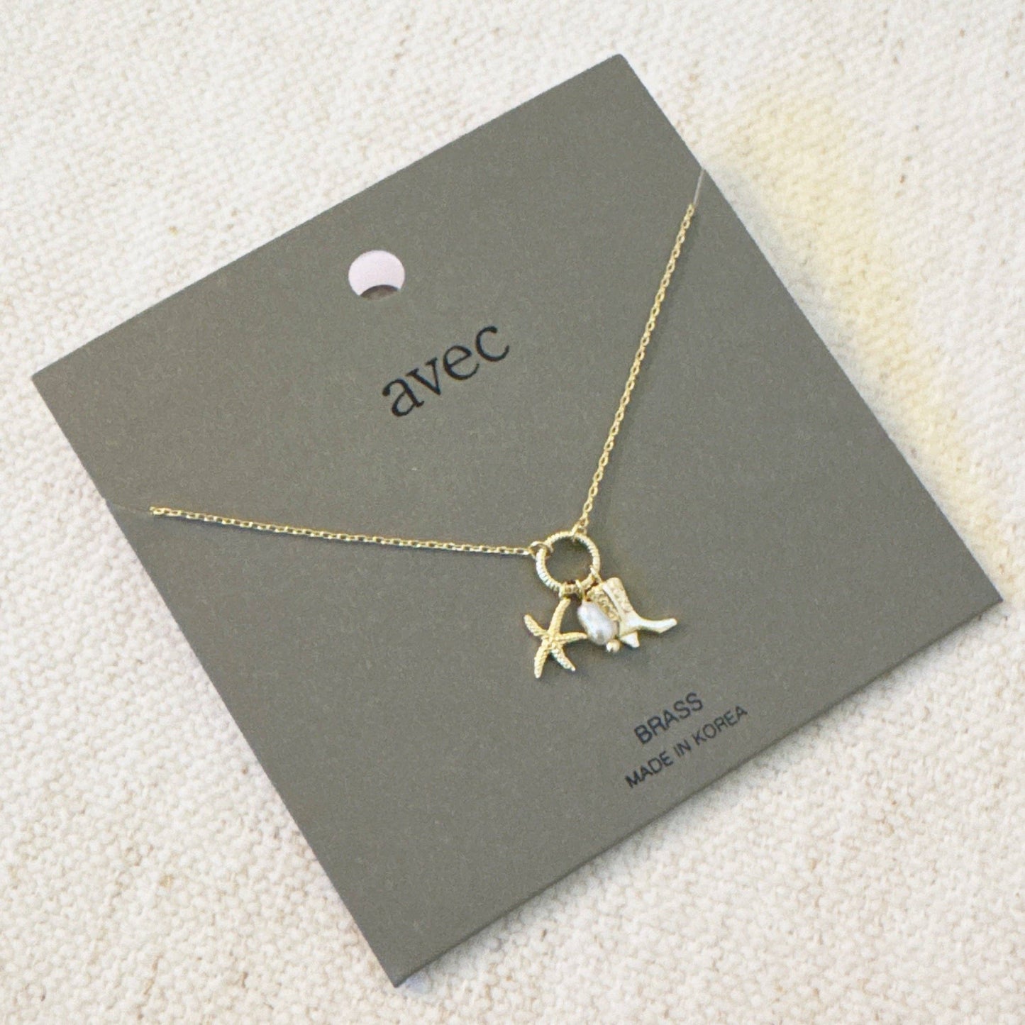 Ellison&Young - Goudkleurige Ketting Coastal Cowgirl met Zeester en Westernlaars bedels