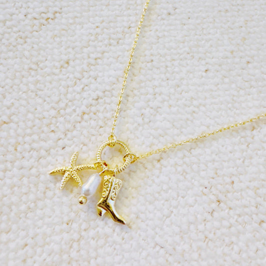 Ellison&Young - Goudkleurige Ketting Coastal Cowgirl met Zeester en Westernlaars bedels